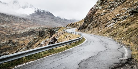 failing asphalt road with cracks